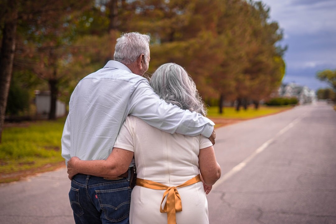Croatian senior couple walking together in a park for exercise