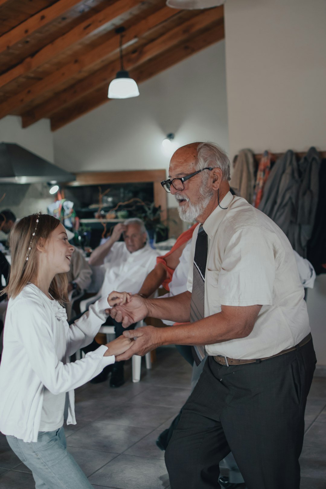Croatian seniors dancing together at a community dance workshop