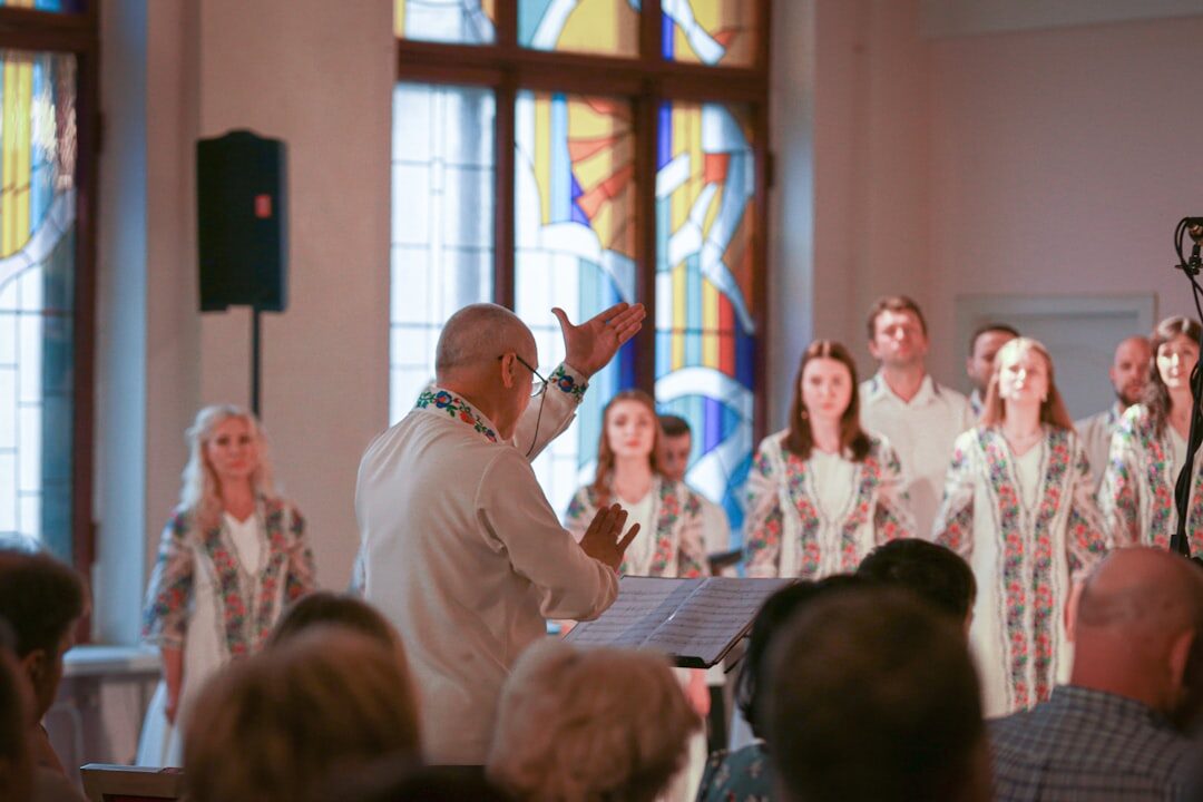 Croatian senior choir singing together in a community hall