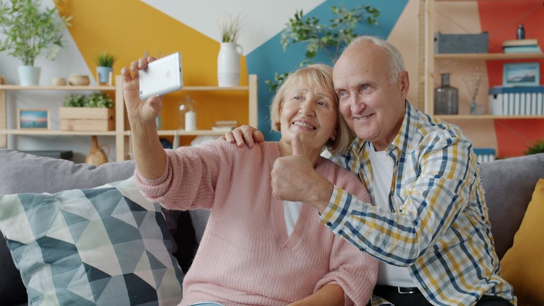 Croatian senior couple reviewing a membership card together at home