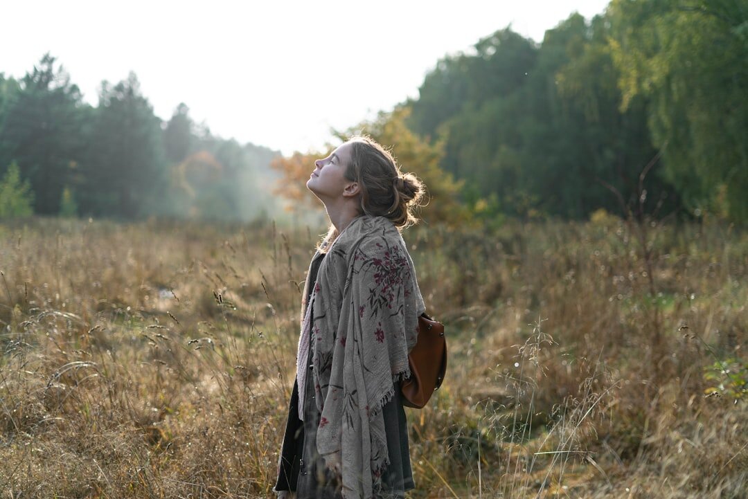 elderly woman walking in nature
