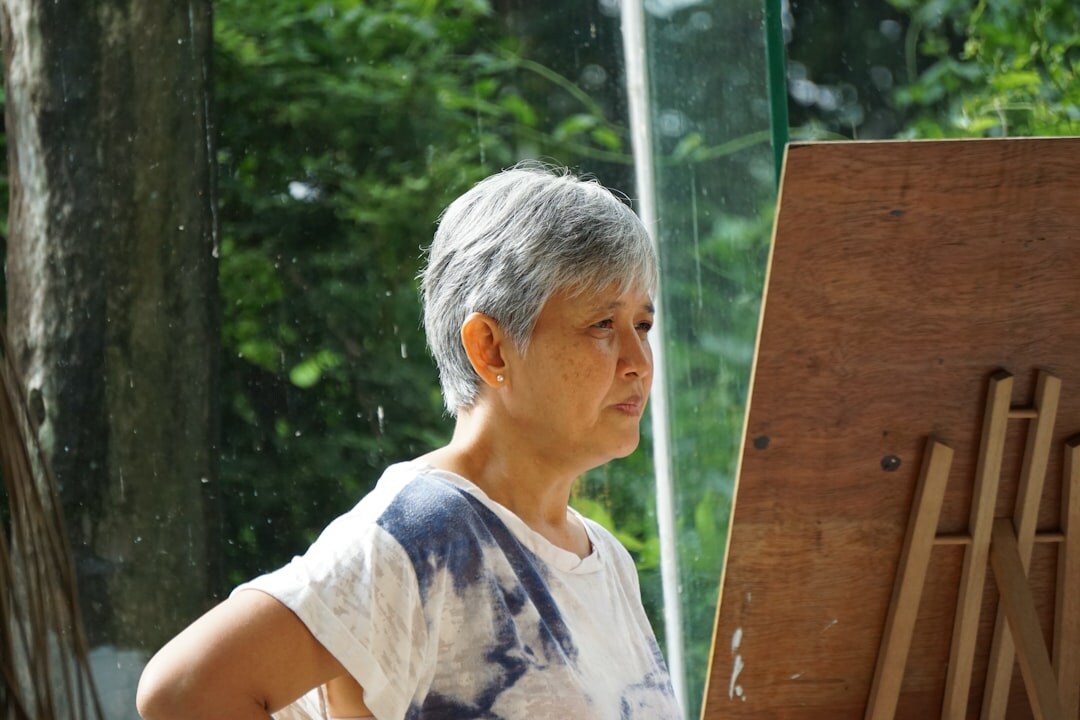 senior woman painting
