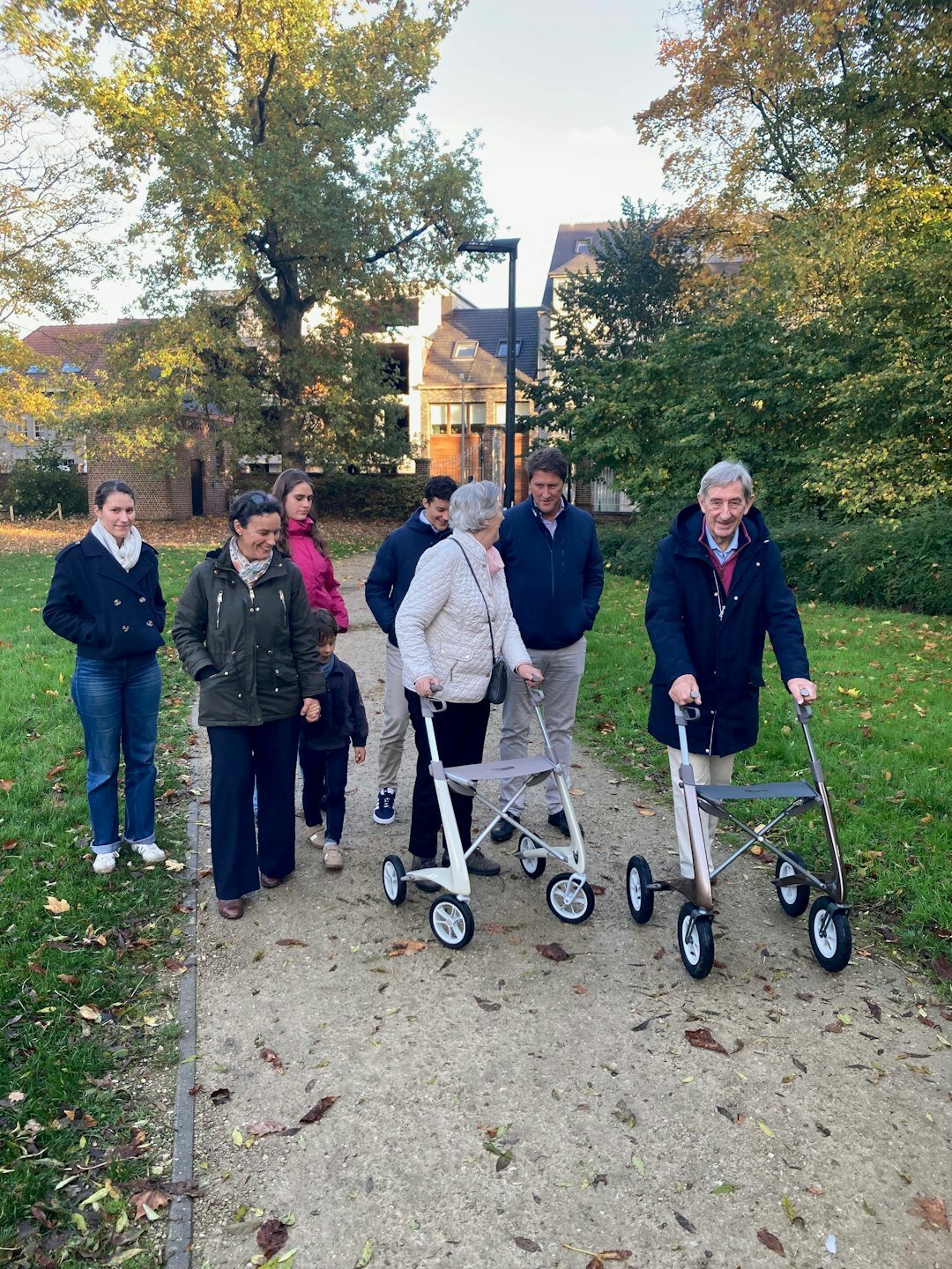 senior couple walking in park