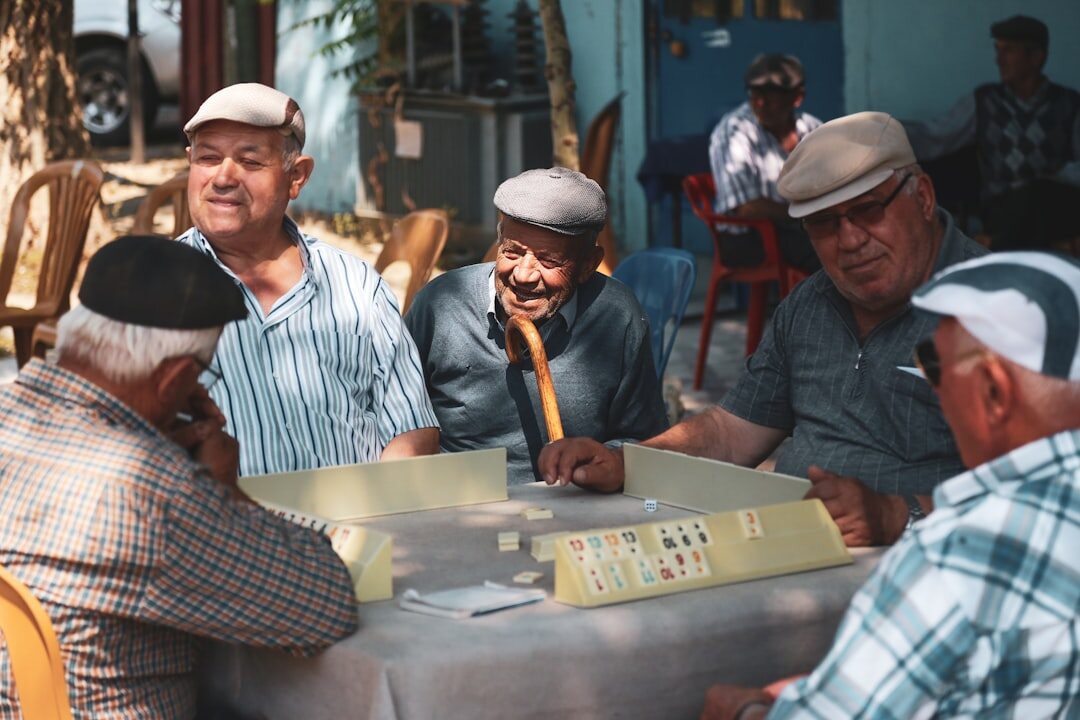 group of seniors playing cards